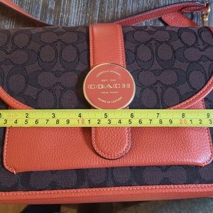 Coach pocket book